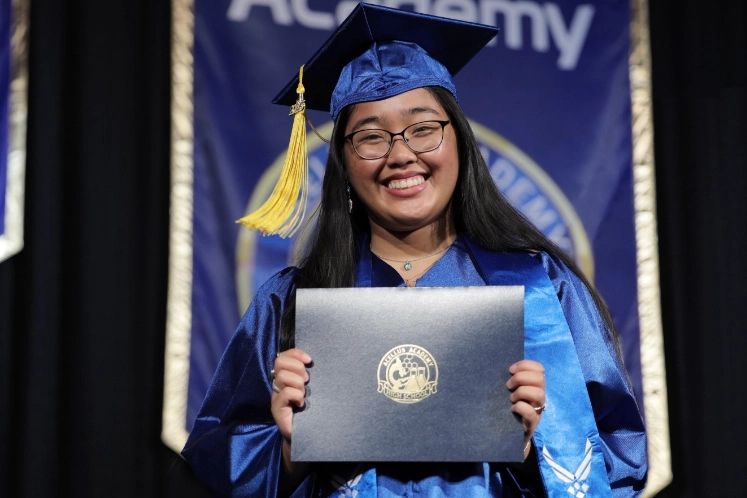 Acellus Academy Graduate Walking the Stage Commencement Ceremony